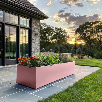 Metal planter and modern house. Long power coated rectangular steel planter thick gauge high quality welded in America USA made craftsman bespoke in the backyard of a modern house. 