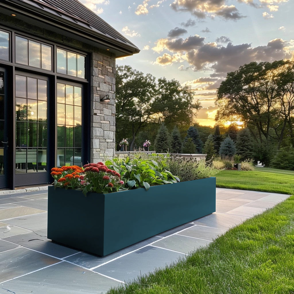 Metal planter and modern house. Long power coated rectangular steel planter thick gauge high quality welded in America USA made craftsman bespoke in the backyard of a modern farmhouse. Metal planter stone house. 