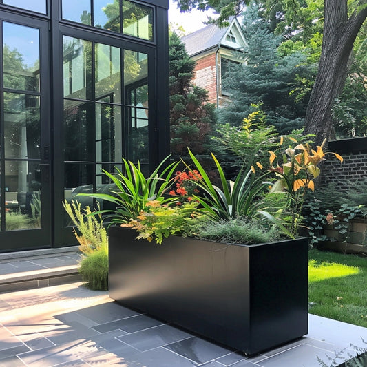 Metal planter and modern house. Long power coated rectangular steel planter thick gauge high quality welded in America USA made craftsman bespoke in the backyard of a modern farmhouse.